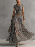 Completo Grigio con Top Trasparente con Inserti in Pizzo e Gonna Maxi Plissettata