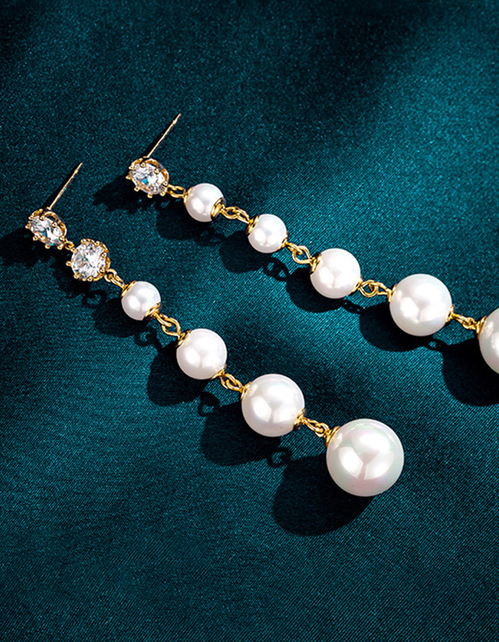 Set di orecchini con perle e zirconi cubici