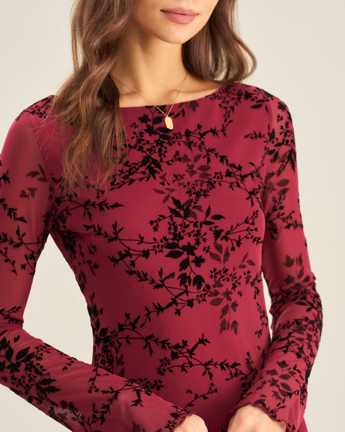 Abito mini rosso in mesh floreale