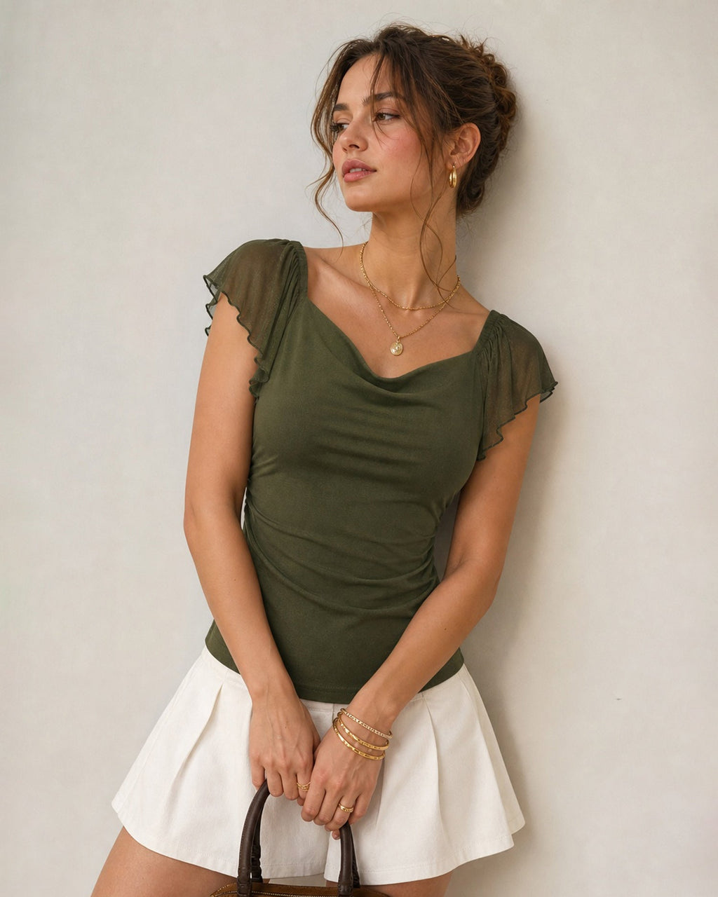 Maglietta verde in mesh arricciata con scollo a cappuccio