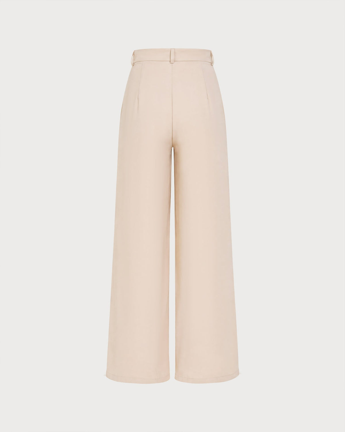 Pantaloni dritti color albicocca con bottoni e tasche