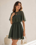 Abito mini verde in chiffon con scollo a cuore