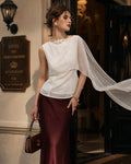 Top color albicocca con scollo a barca in chiffon